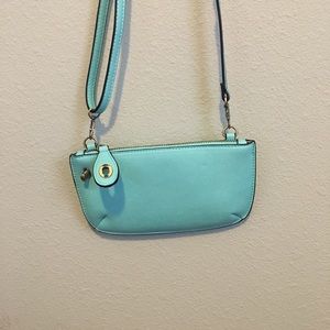 Joy Susan purse turquoise.